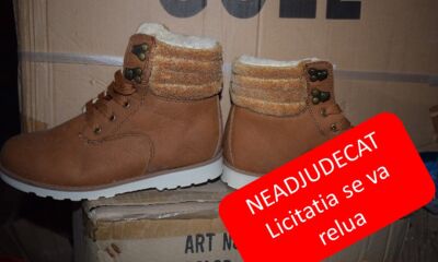 Stoc de marfa incaltaminte, curele, genti, materiale textile, tesaturi, geci, pantaloni - a doua licitație